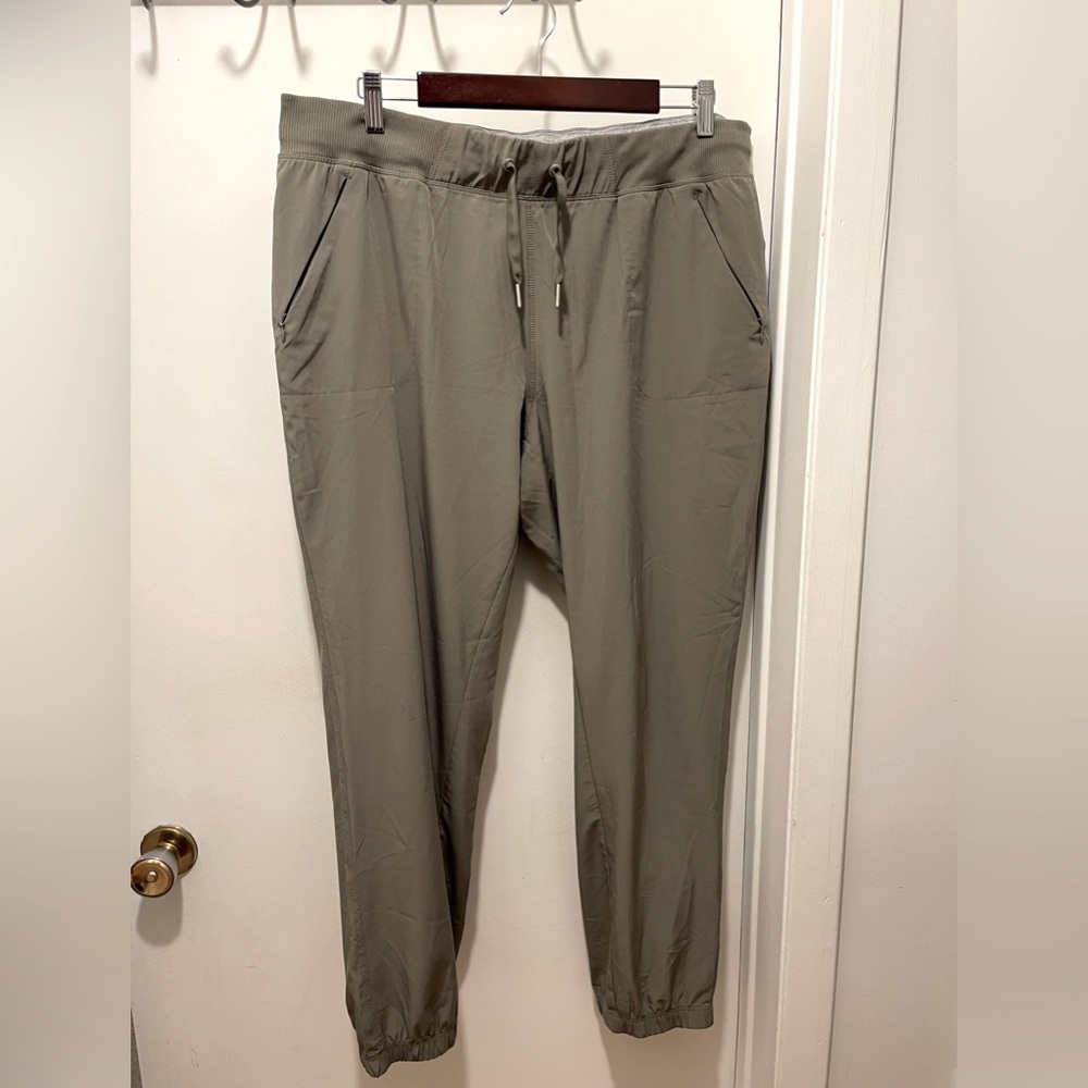Calvin Kline army green wind performance pants. XL size